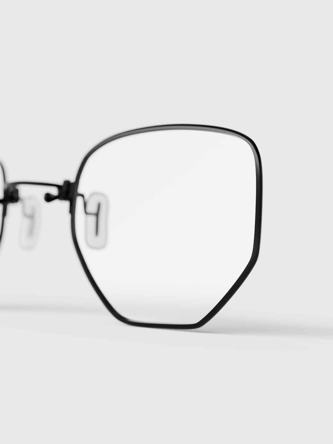 Glasses' right lens detail